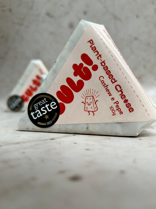 A wedge of cashew e pepe displaying the great taste award
